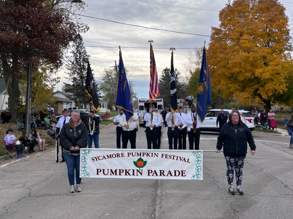 Sycamore Pumpkin Festival parade banner and procession. 